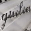 105265610200 Alfa Romeo Giulia Super Badge Scritta Stemma View Right