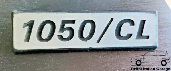4395287 Badge Scritta - Fiat 127 1050 CL View Front