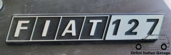 4449296 Badge Scritta - Fiat 127 MK2 View Front