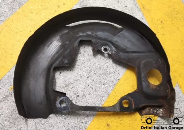 5939696 - Left Front Disc Brake Dust Metal Cover - Fiat Uno MK1 MK2 View Front