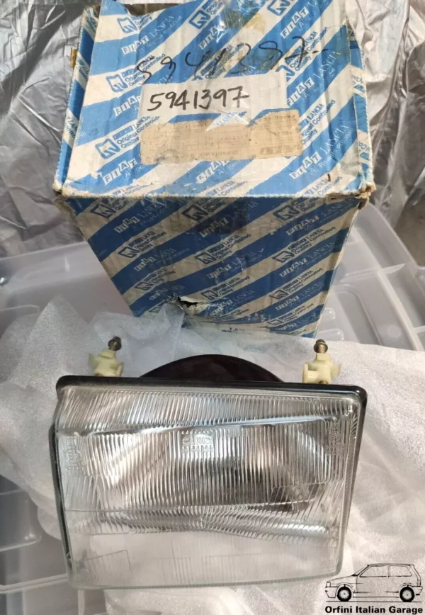 5941397 7643492 Front Left Elma Arteb Headlight - Fiat Uno MK1 View Rear