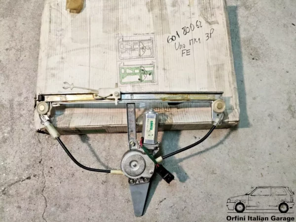 7539069 - Electric Left Window Regulator Motor - Fiat Uno MK1 3 Doors View Front