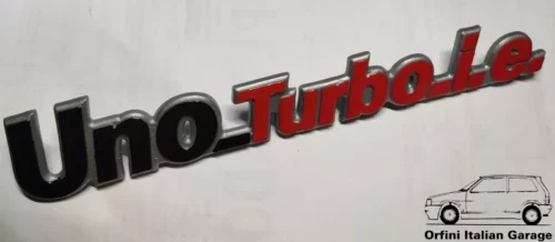 7562935 7653251 - Rear Badge Scritta - Fiat Uno Turbo IE MK1 View Front