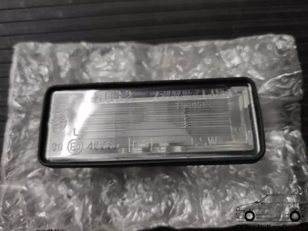 7569564 - License Plate Light - Fiat Tipo Tempra Lancia Dedra View Front