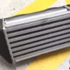7570366 7551336 - Intercooler Fiat Uno Turbo IE + Turbo D MK2 With Conveyor View Rear