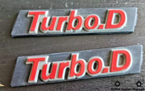 7600454 - Front Grill Badge Scritta - Fiat Uno Turbo D Diesel View Front