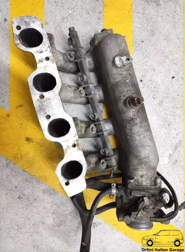 7632973 7765763 Intake Manifold + Throttle Body Lancia Delta 4WD 8V HF Turbo View Rear