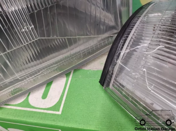 7700027 7683231 Front Left Valeo Headlight - Fiat Uno MK2 View Rear