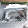 7717887 7728479 Front Left Headlight - Lancia Y10 1992-1995 View Rear