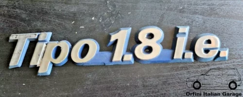 7725974 Rear Badge Scritta - Fiat Tipo 1.8 ie View Front