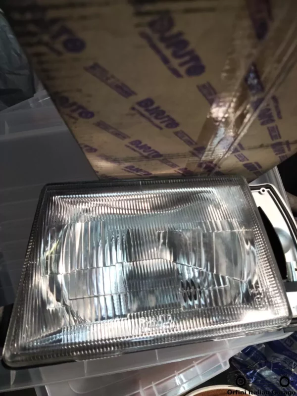 7730012 7740558 7628295 Front Left Headlight - Lancia Y10 up to 1992 View Front