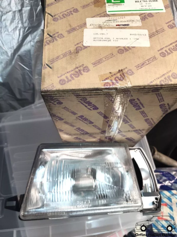 7730012 7740558 7628295 Front Left Headlight - Lancia Y10 up to 1992 View Rear