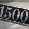 82400070 Badge Scritta Stemma Lancia Delta Prisma 1500 View Rear