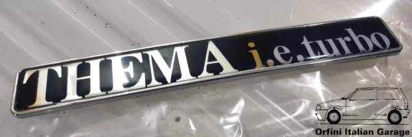 82434198 82426465 Rear Badge Scritta Lancia Thema IE Turbo S1 View Rear