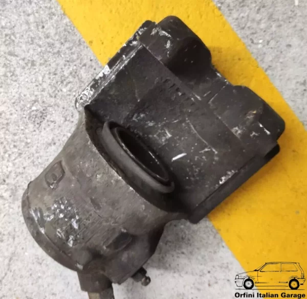 9946182 792286 - Left Brake Caliper Fiat Uno Panda Lancia Y10 Ritmo Regata 131 View Front