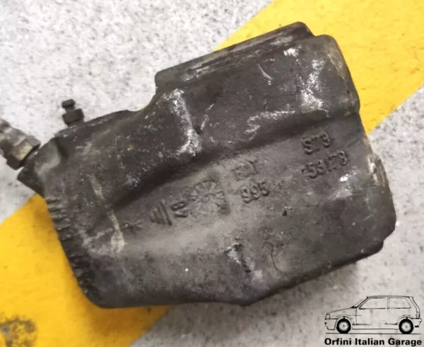 9946182 792286 - Left Brake Caliper Fiat Uno Panda Lancia Y10 Ritmo Regata 131 View Rear
