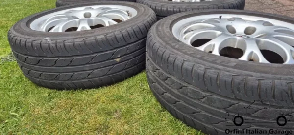 11306-60657230-2.webp 60657230 Set Wheels 16 Alfa Romeo Spider GTV 916 w/ Tyres