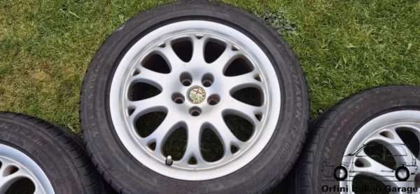 11306-60657230-4.webp 60657230 Set Wheels 16 Alfa Romeo Spider GTV 916 w/ Tyres