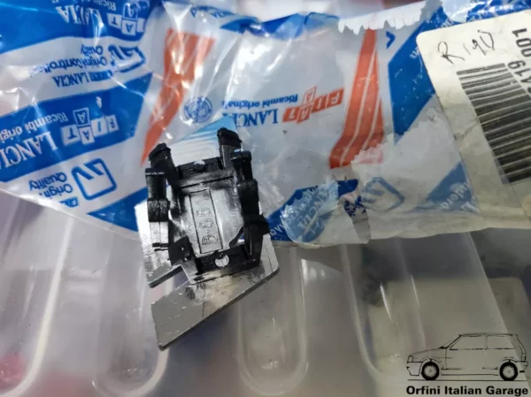 11315-82476419-2.webp 82476419 Front Grill Badge Scritta Lancia Delta HF