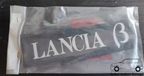 3028-82381204.webp 82381204 Badge Scritta Lancia Beta