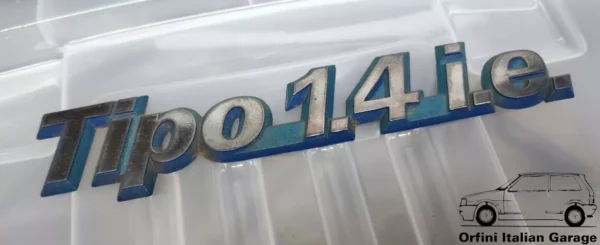 7725972  Rear Badge Scritta Fiat Tipo 1.4 i.e.