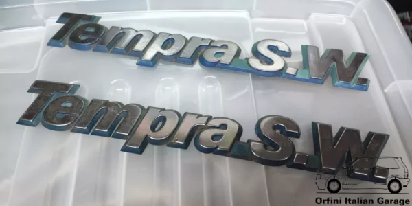 12091-7722311.webp 7722311 Rear Badge Scritta Fiat Tempra S.W.