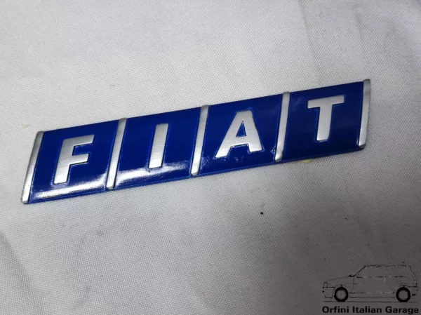 12703-46305472-1.webp 46305472 Rear Badge Scritta Fiat Coupe