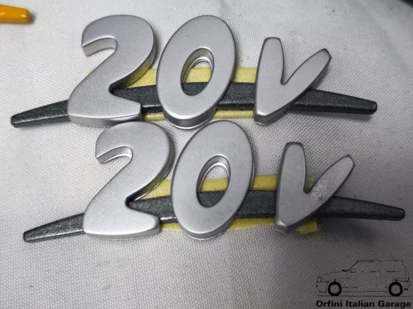 12713-125307064.webp 125307064 Pair Side Badge Scritta Grey Fiat Coupe 20V Turbo